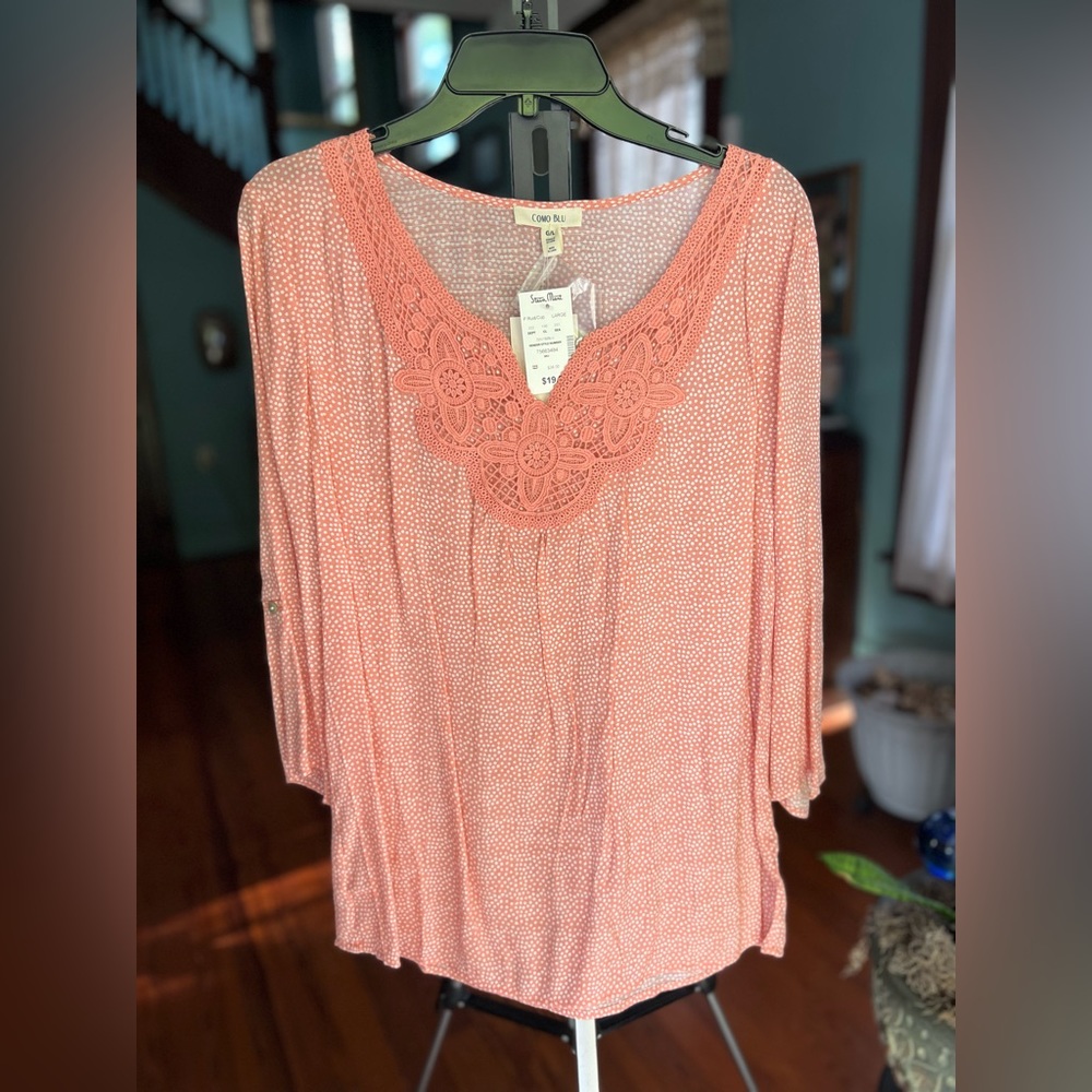 Lightweight summer peach blouse with Lacey overlay at neckline.
